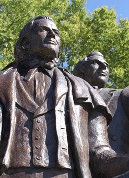 Brigham Young and Joseph Smith look West